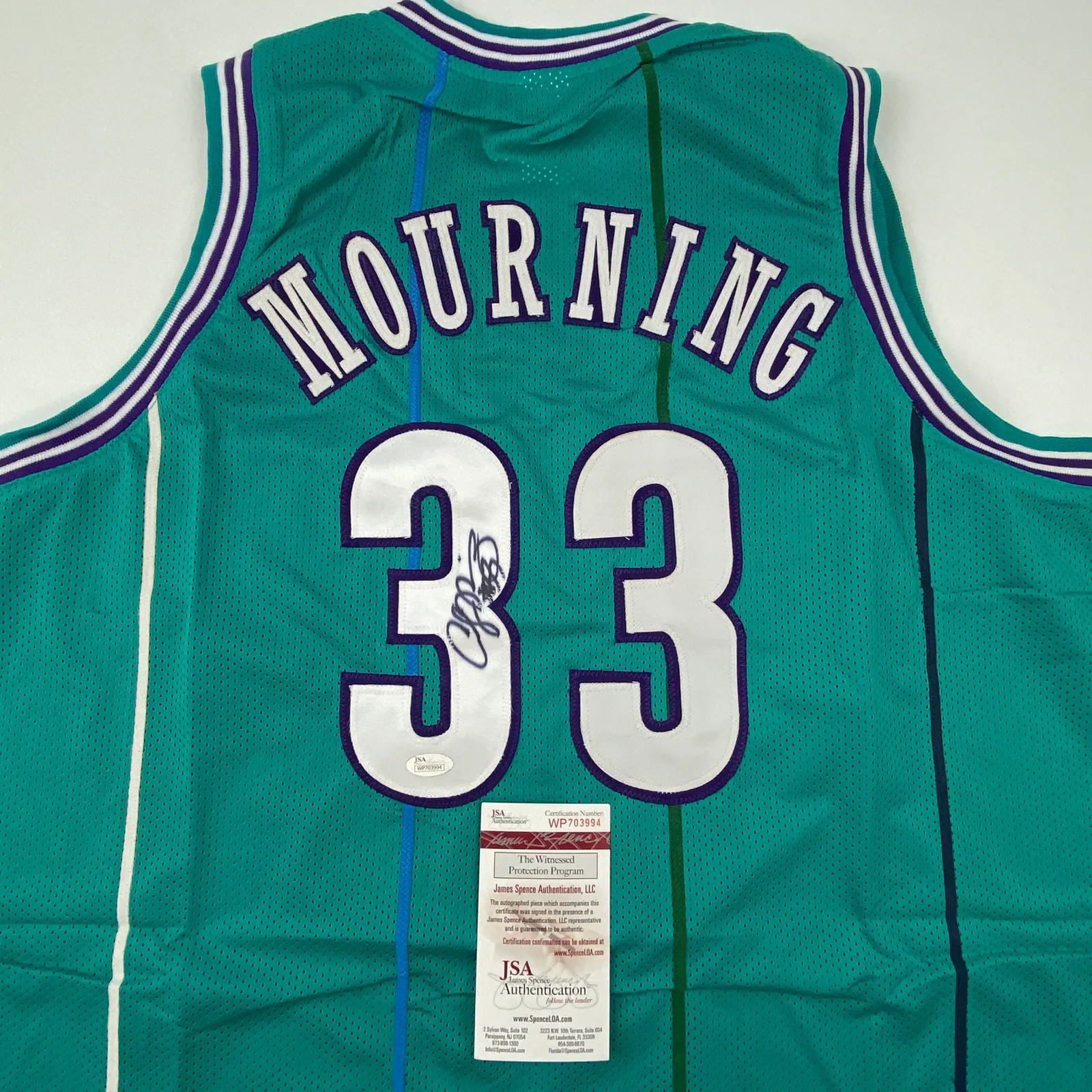Autographed/Signed Alonzo Mourning Charlotte Teal Basketball Jersey JSA COA