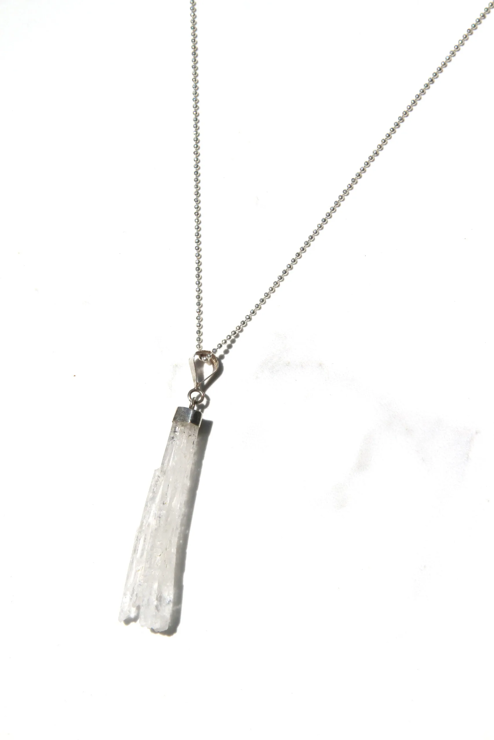 Faden Quartz Crystal Pendant